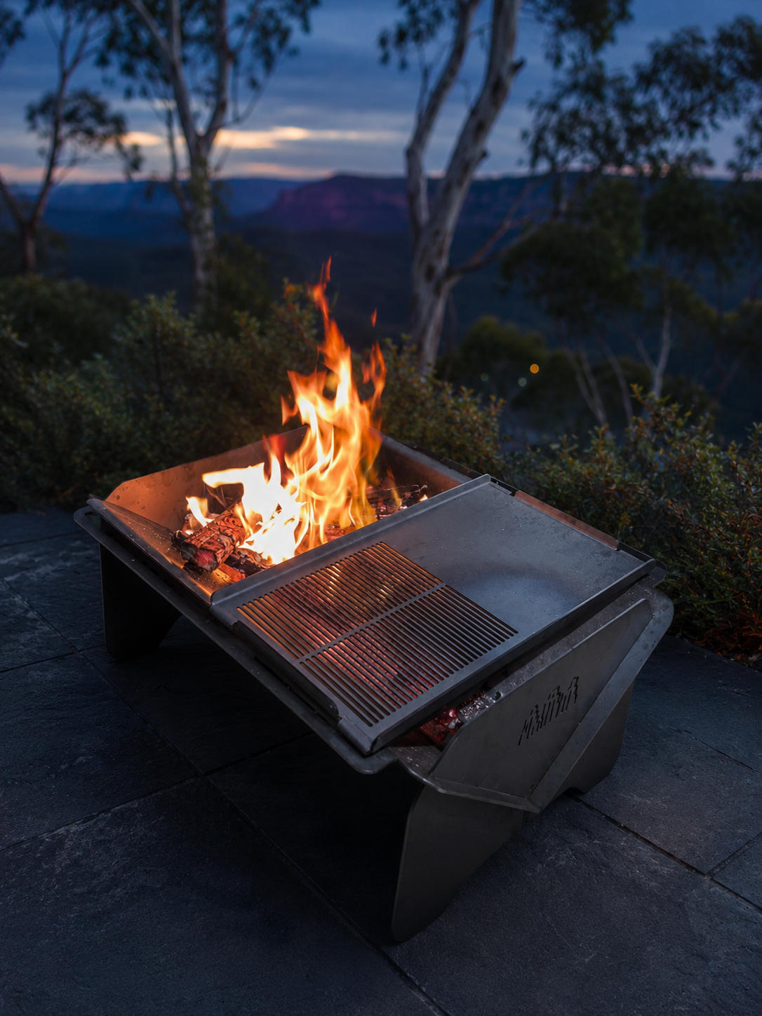 Wild Ember fire pit burning in a Blue Mountains setting at blue hour