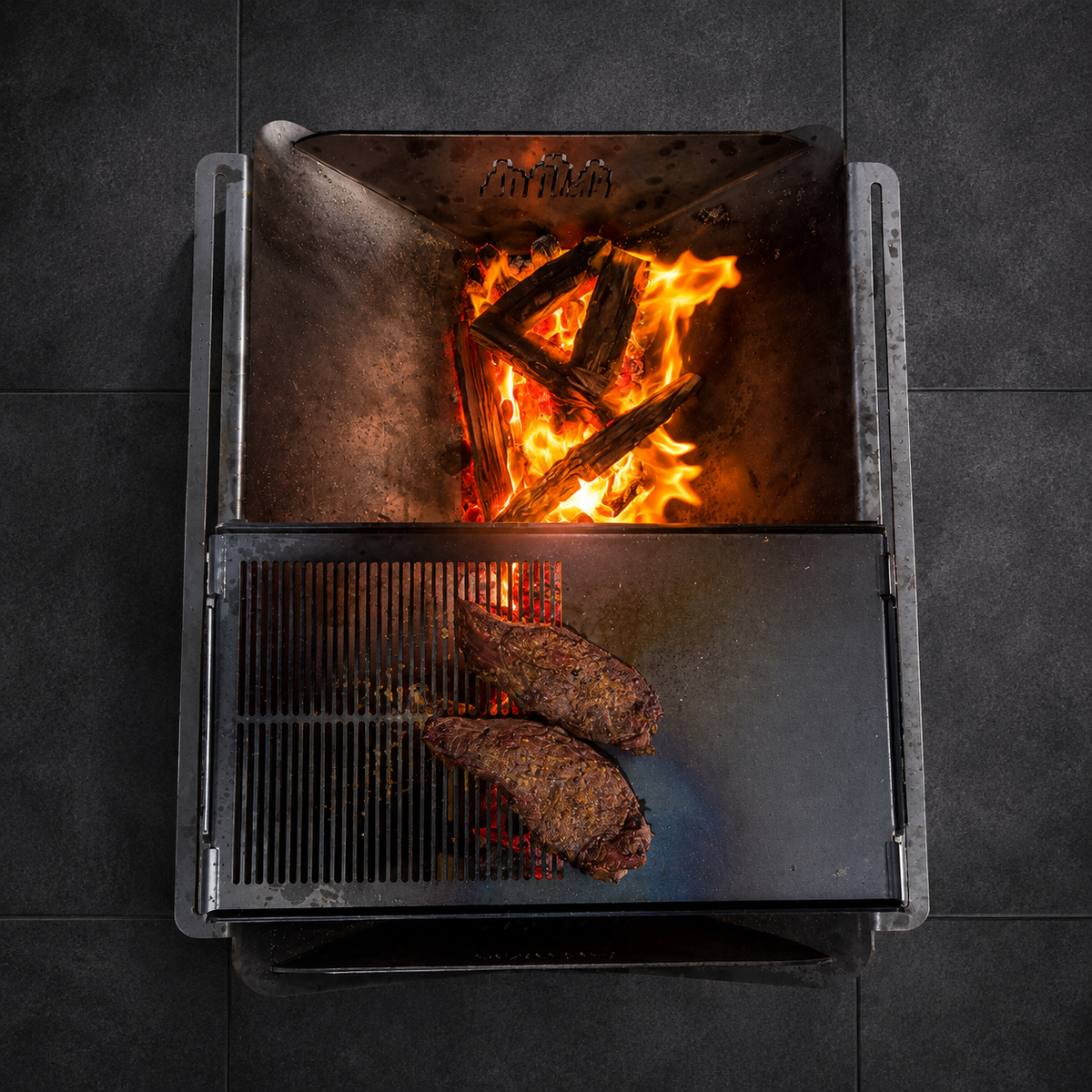 Overhead view of the Wild Ember fire pit, grill and hotplate
